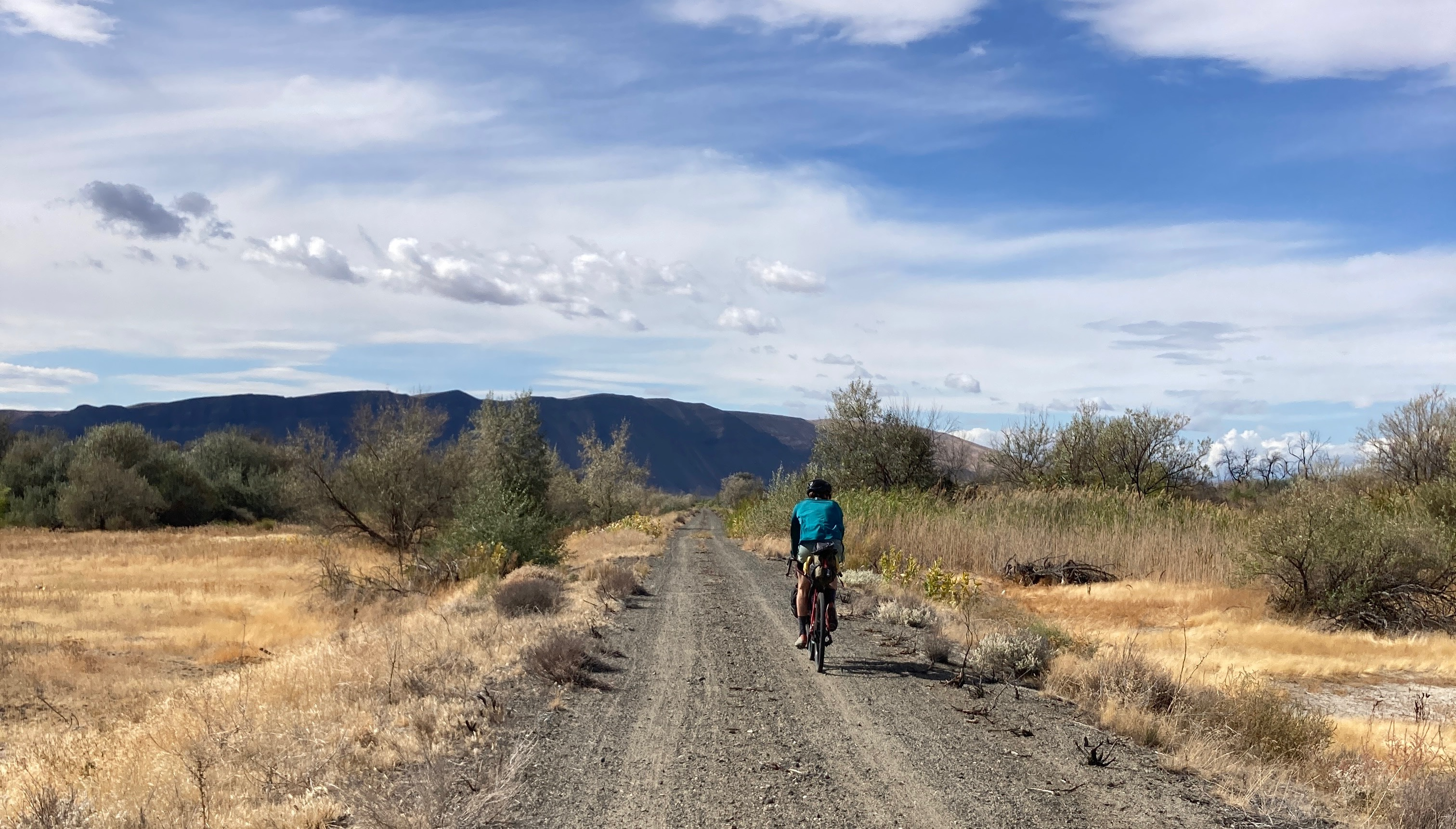 Riding down a dirt road